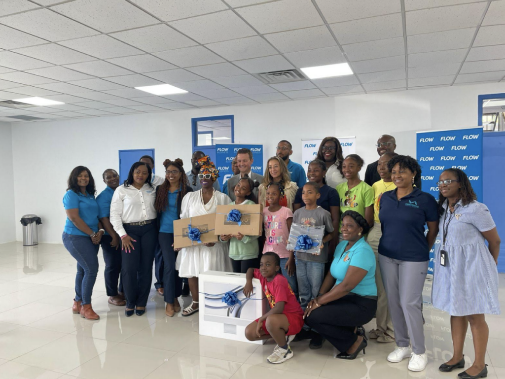 Charitable arm of Flow donates computers to Unite BVI and YEP